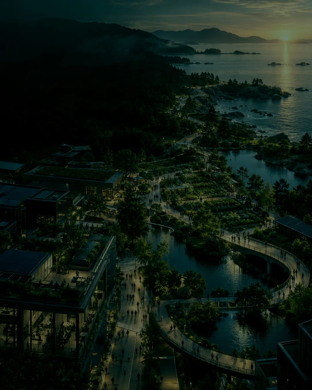 An aerial view of a regenerative campus by the sea at dusk